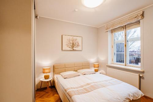 Postel nebo postele na pokoji v ubytování AirHome - Sulevimägi Apartment
