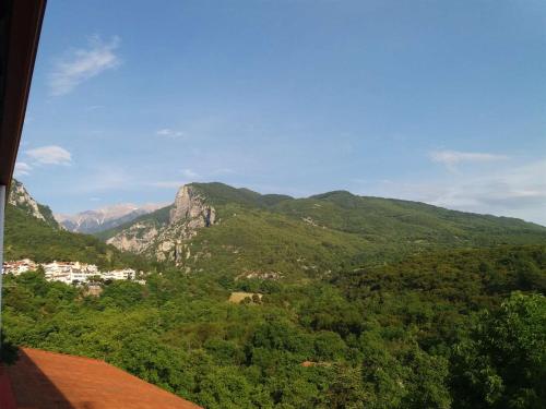 a view of a valley with trees and mountains at Olympus View Rooms Sauna & Spa in Litochoro