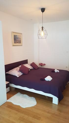 Postel nebo postele na pokoji v ubytování Penthouse HEART OF SLAVONIA ****