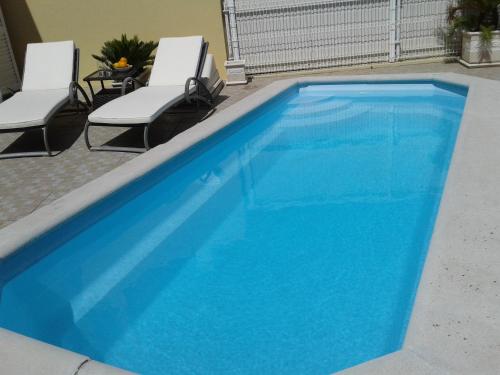 The swimming pool at or near Charmosa vila/Vilamoura