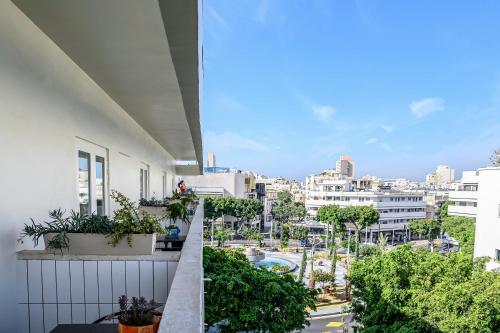 a balcony with a view of a city at Center Chic Hotel - an Atlas Boutique Hotel in Tel Aviv