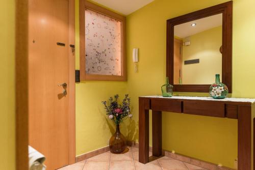 a bathroom with a sink and a mirror at Cal Carreró in Claravalls