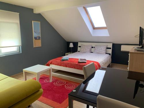 Postel nebo postele na pokoji v ubytování Celic Art Apartments