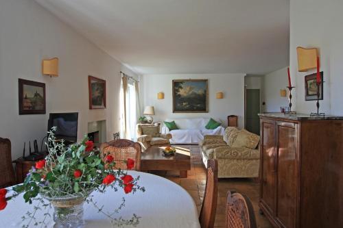 a living room with a couch and a table at Vigna Luisa Resort - Near Rome in Genzano di Roma