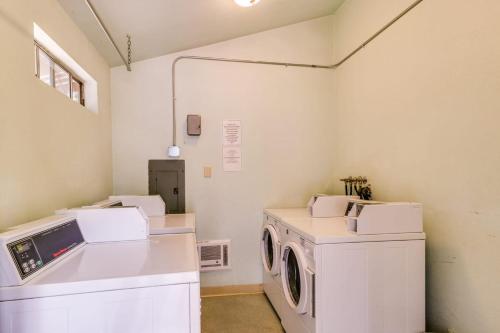 a laundry room with a washer and dryer in it at Hidden Valley Condominiums in Mammoth Lakes