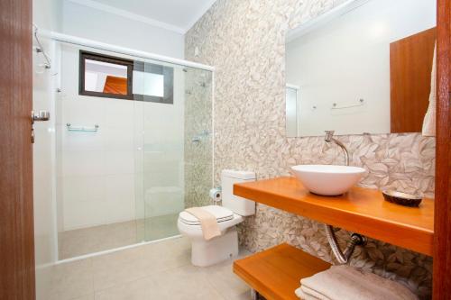 Ванная комната в Barra Holiday Apartamentos