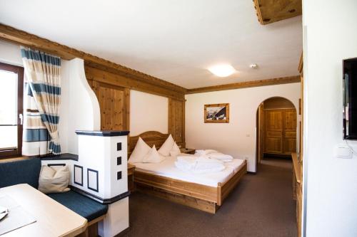 Кровать или кровати в номере Landhaus Schnöller