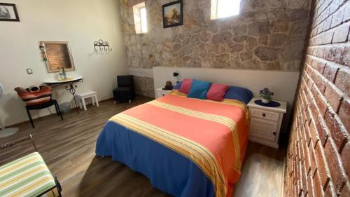Postel nebo postele na pokoji v ubytování Casa Ana Celia