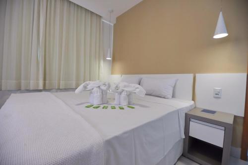 Ліжко або ліжка в номері Resort do Lago - Caldas Novas