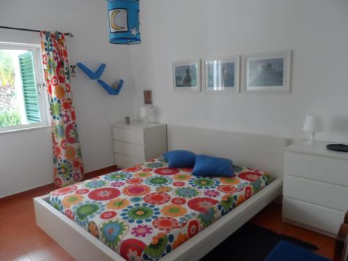 Кровать или кровати в номере Casa do Algarve