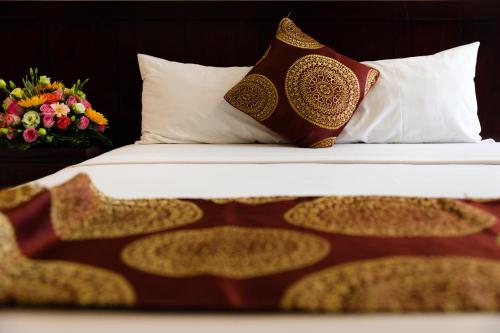 Cama o camas de una habitación en Azura Hotel