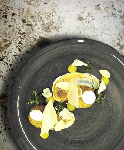 a plate of food with fruit and vegetables on it at Granny Mouse Country House & Spa in Balgowan