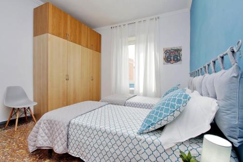 Un ou plusieurs lits dans un hébergement de l'établissement Martino Delightful Apartment