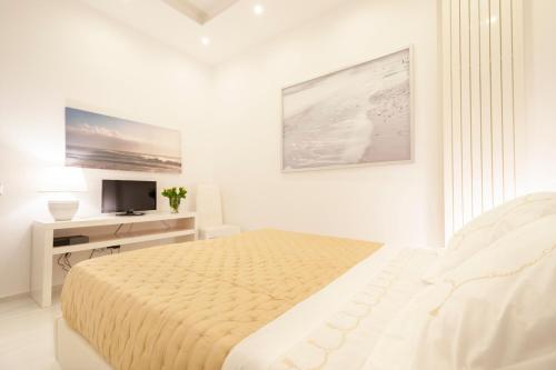 Ένα ή περισσότερα κρεβάτια σε δωμάτιο στο Via Dante Luxury Home