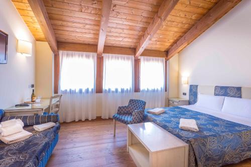 Кровать или кровати в номере Dune Agriturismo