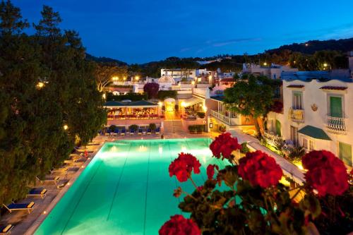 an overhead view of a swimming pool at night at Hotel Continental Ischia in Ischia