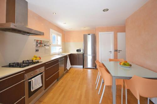 Kuchyň nebo kuchyňský kout v ubytování Camamila House