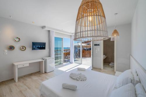 Postel nebo postele na pokoji v ubytování Raffaello Beach