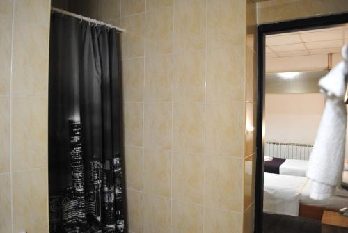 Ένα ή περισσότερα κρεβάτια σε δωμάτιο στο Hotel Fala Zagreb