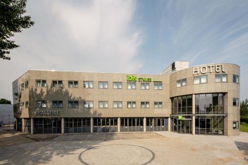 a building with a hotel on top of it at ibis Styles Almere in Almere