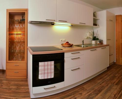 A kitchen or kitchenette at Apartments Rezia