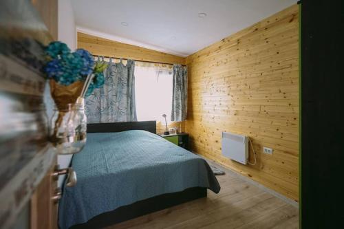 Un pat sau paturi într-o cameră la Casa Kokopelli