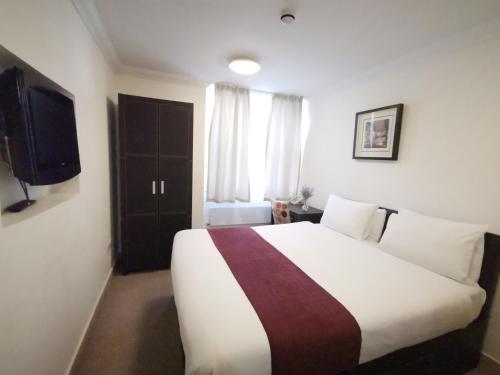 Katil atau katil-katil dalam bilik di The Royale Chulan Hyde Park Hotel