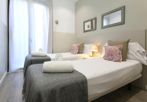 Katil atau katil-katil dalam bilik di Suite Place Barcelona Còrsega