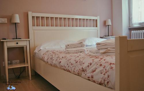 Posteľ alebo postele v izbe v ubytovaní Ale&Andrea Apartments BLU & LILLA