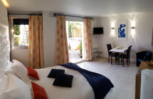 Ένα ή περισσότερα κρεβάτια σε δωμάτιο στο Chambre d'hôtes La Potinière