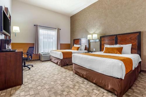 Ένα ή περισσότερα κρεβάτια σε δωμάτιο στο Comfort Inn Chihuahua