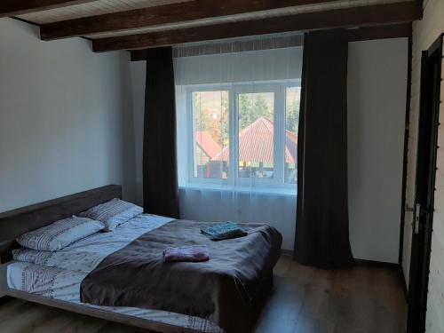 Una cama o camas en una habitación de Бо&Не