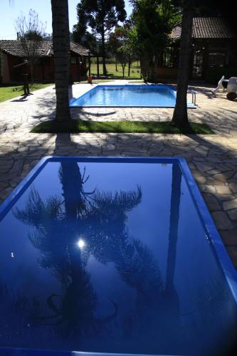 Kolam renang di atau dekat dengan Pousada Vila Minas