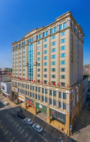 an overhead view of a large building in a city at 东莞君兰酒店 Grand land hotel in Dongguan