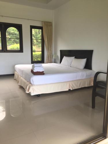 Voodi või voodid majutusasutuse Khaolak Hillside Villa toas