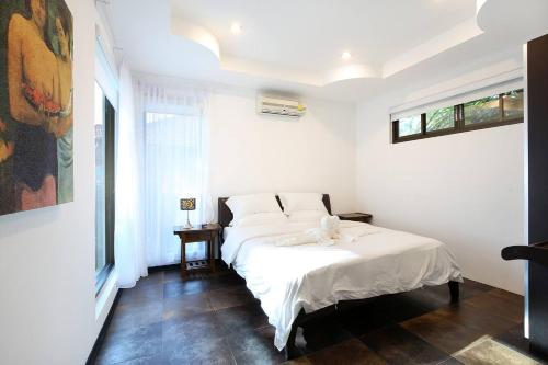 Phangan Luxry Beach Villaにあるベッド