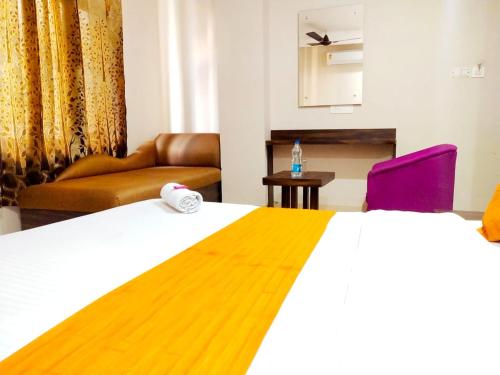 Postel nebo postele na pokoji v ubytování Hotel Sukhman Residency