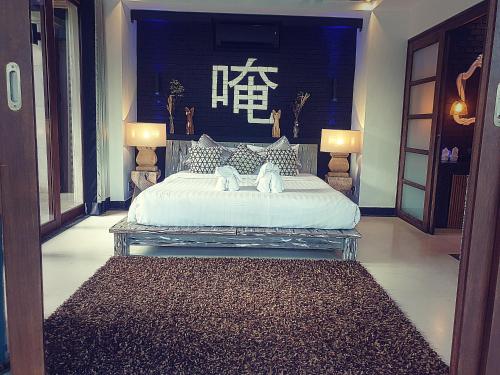 Postelja oz. postelje v sobi nastanitve Zen Villas