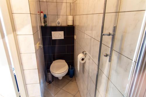 Koupelna v ubytování Gastenverblijf 't Smedenhuys