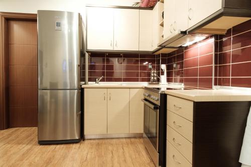 Η κουζίνα ή μικρή κουζίνα στο Cleopatra apartment