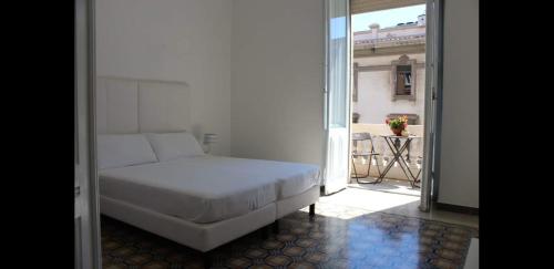 Posteľ alebo postele v izbe v ubytovaní Cagliari d'Amare Via Roma