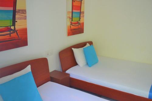 Cama o camas de una habitación en D'Villa Garden House