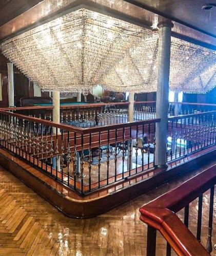 a bar with a lot of wine bottles on display at King Tut I Nile Cruise - Every Monday 4 Nights from Luxor - Every Friday 7 Nights from Aswan in Luxor