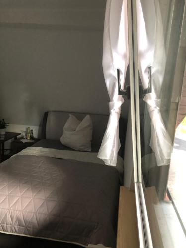 Ein Bett oder Betten in einem Zimmer der Unterkunft Waldhotel Nachtigall