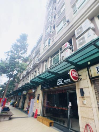 a store on the side of a building at Love Feng Jia Apartment Hotel in Taichung