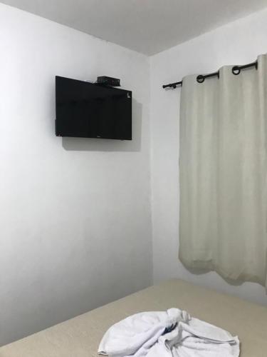 Μια τηλεόραση ή/και κέντρο ψυχαγωγίας στο Pousada Anjos da Montanha