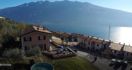 a group of buildings with a view of the water at Infinity in Tignale