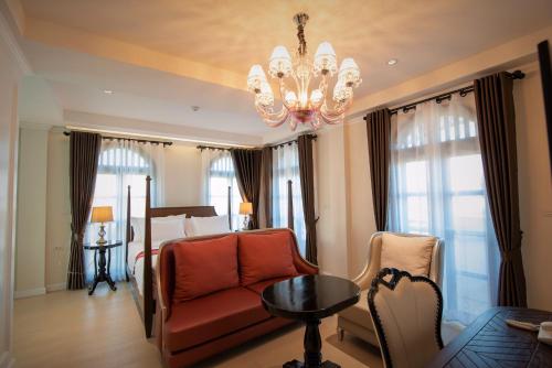 Area soggiorno di Nanta Glam CM Hotel & Residences