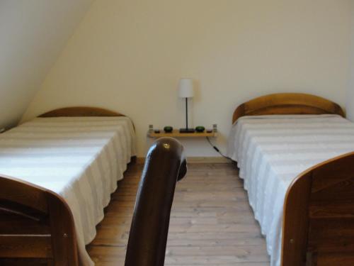 Cama o camas de una habitación en Apartament Kościelisko