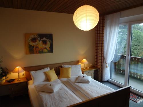 En eller flere senge i et værelse på Haus Christine Aigen-Schlägl - Große Mühl